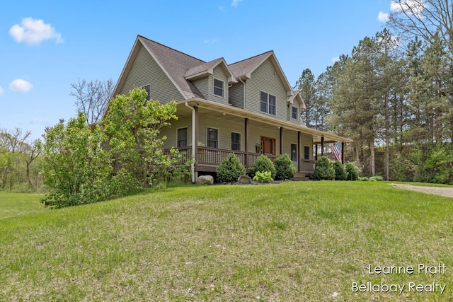 3389 Shultz Rd, Hastings, MI 49058 - farmhouse with a porch and a front lawn