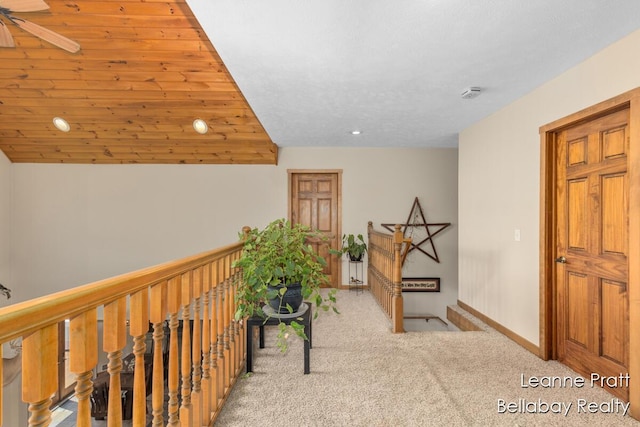3389 Shultz Rd, Hastings, MI 49058 - hallway featuring carpet flooring, baseboards, recessed lighting, and an upstairs landing