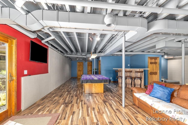 3389 Shultz Rd, Hastings, MI 49058 - basement with wood finished floors and pool table