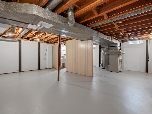 below grade area featuring heating unit