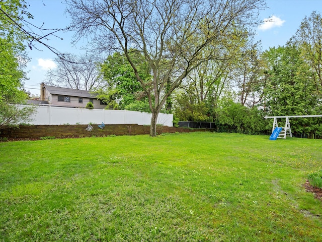 view of yard with a playground