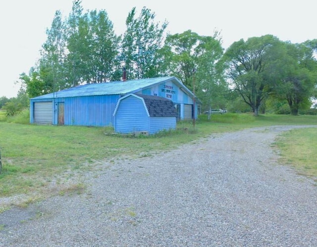 17931 30th Ave, Barryton, MI 49305 - view of outdoor structure with driveway and an outbuilding