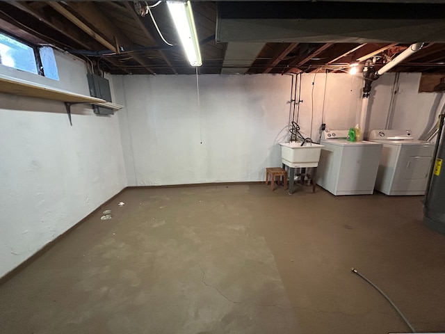 23851 Annapolis St, Dearborn Heights, MI 48125 - unfinished below grade area featuring independent washer and dryer and a sink