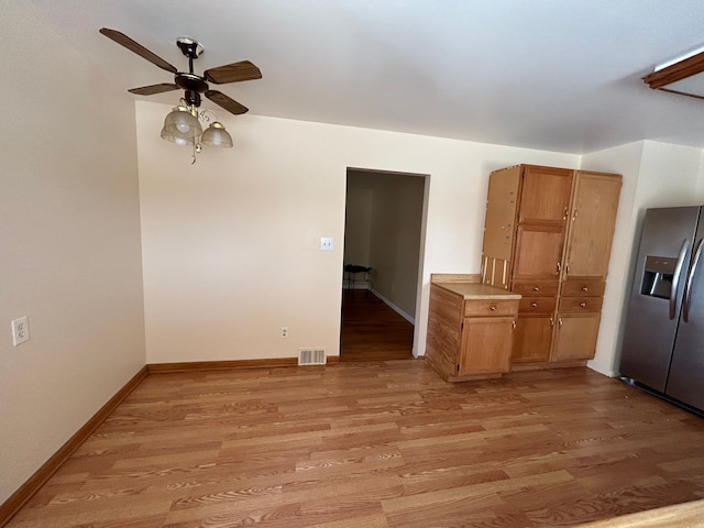 23851 Annapolis St, Dearborn Heights, MI 48125 - empty room featuring light wood-type flooring, a ceiling fan, and baseboards