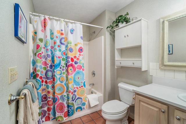 bathroom with shower / tub combo with curtain, vanity, toilet, tile patterned flooring, and a textured ceiling
