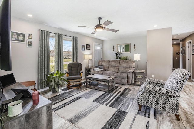 554 Ottawa Trl, Buckley, MI 49620 - living area featuring ceiling fan, wood finished floors, and recessed lighting