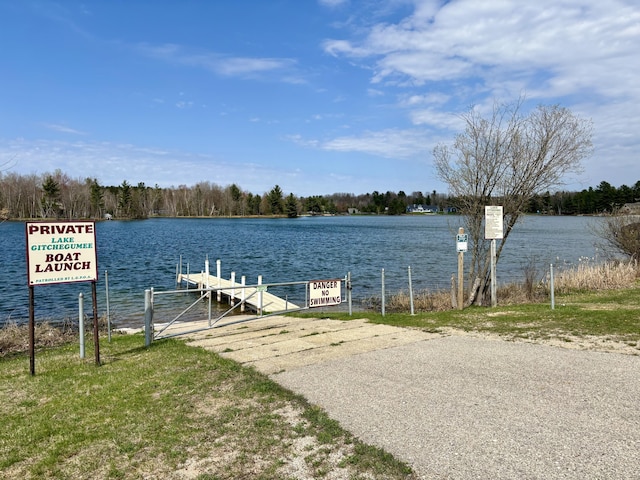 554 Ottawa Trl, Buckley, MI 49620 - dock area featuring a water view