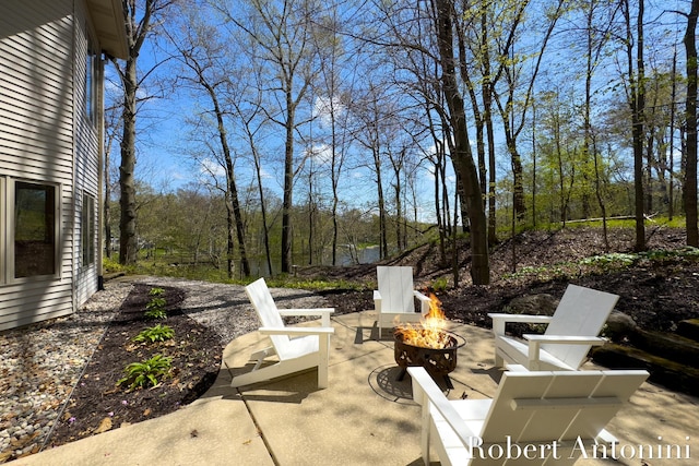 view of patio / terrace with a fire pit