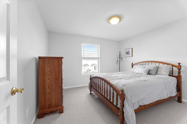 24231 Wilson Dr, Trenton, MI 48183 - bedroom with carpet flooring and baseboards