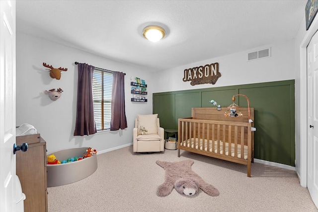 24231 Wilson Dr, Trenton, MI 48183 - carpeted bedroom featuring a nursery area and baseboards
