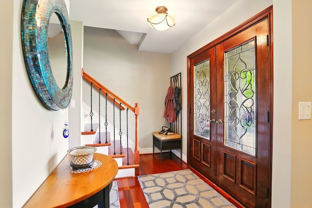 1438 Leafgreen Dr, Troy, MI 48083 - foyer entrance featuring wood finished floors, stairs, french doors, and baseboards