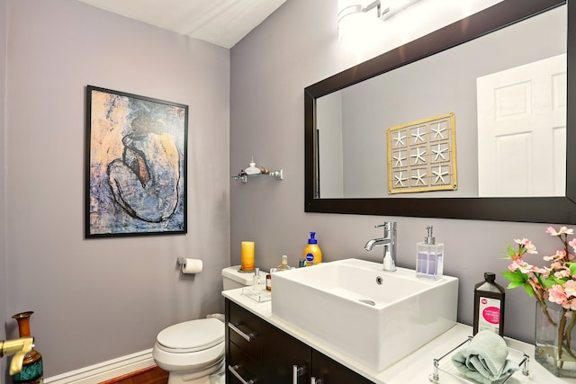 1438 Leafgreen Dr, Troy, MI 48083 - bathroom with toilet, vanity, and baseboards