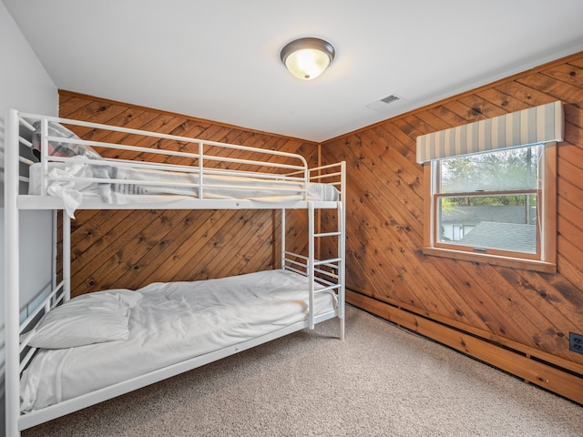 4825 Downing Dr, Pinckney, MI 48169 - bedroom featuring wood walls and carpet