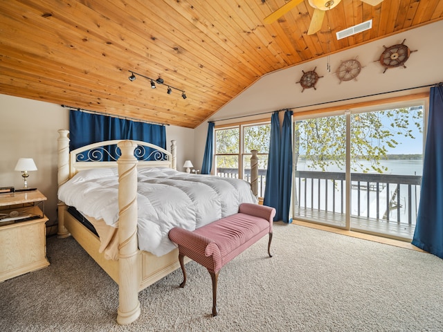 4825 Downing Dr, Pinckney, MI 48169 - bedroom with carpet flooring, access to exterior, vaulted ceiling, wooden ceiling, and rail lighting