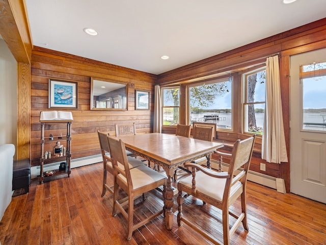 4825 Downing Dr, Pinckney, MI 48169 - dining area with wooden walls, hardwood / wood-style flooring, and recessed lighting