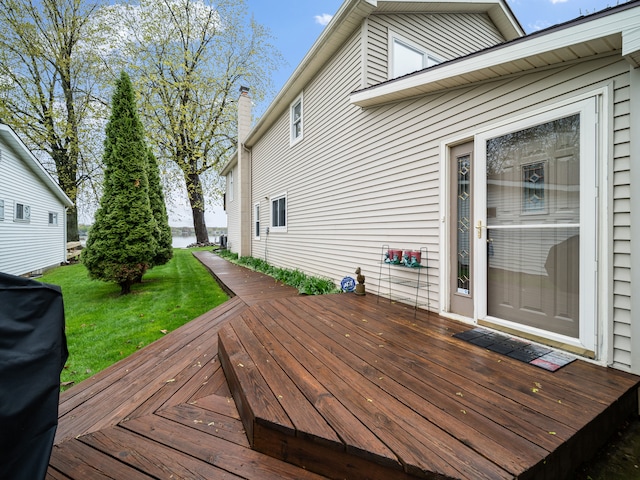 4825 Downing Dr, Pinckney, MI 48169 - wooden terrace with a yard and grilling area