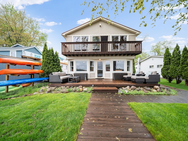 4825 Downing Dr, Pinckney, MI 48169 - rear view of house with outdoor lounge area, a lawn, and a deck