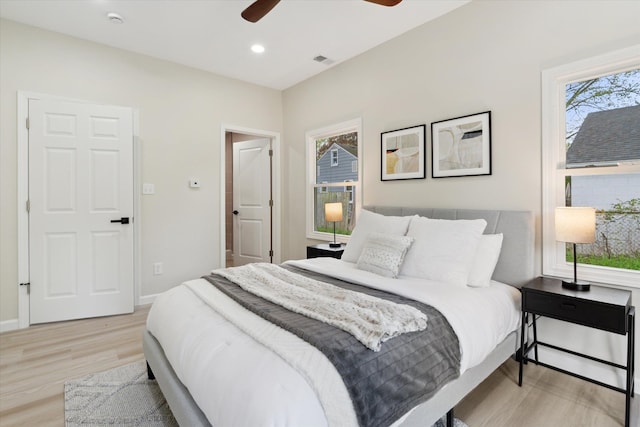 1077 E 14 Mile Rd, Clawson, MI 48017 - bedroom with light wood-style flooring, baseboards, recessed lighting, and a ceiling fan
