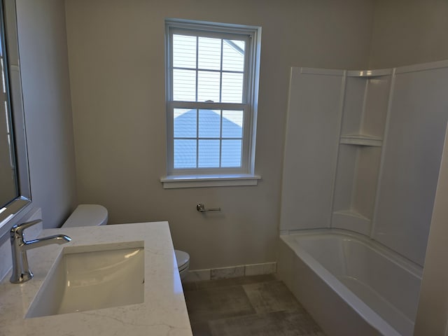 319 Sedgewood Ln, Ann Arbor, MI 48103 - full bath featuring toilet, plenty of natural light, baseboards, and vanity