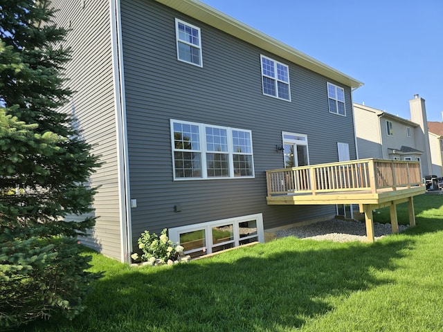 319 Sedgewood Ln, Ann Arbor, MI 48103 - back of house featuring a yard and a deck