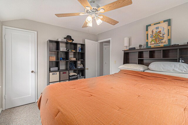 2682 Pinehurst Rd, Norton Shores, MI 49441 - bedroom with vaulted ceiling, carpet floors, and a ceiling fan