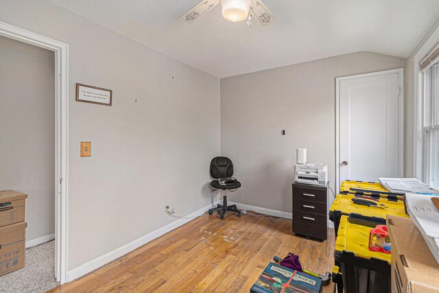 2682 Pinehurst Rd, Norton Shores, MI 49441 - miscellaneous room with vaulted ceiling, light wood finished floors, baseboards, and a ceiling fan
