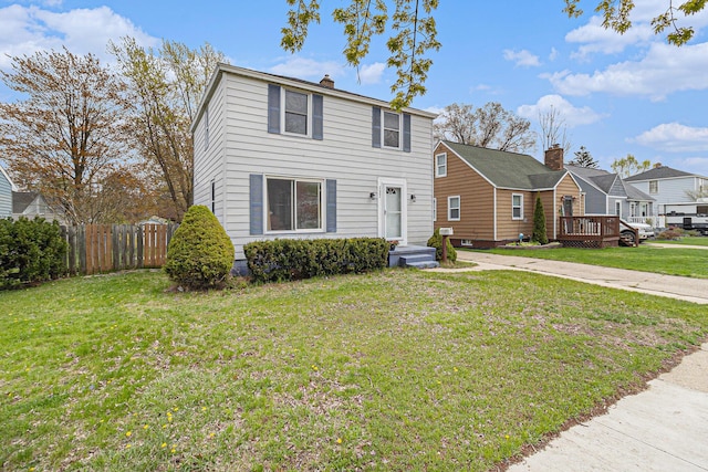 2682 Pinehurst Rd, Norton Shores, MI 49441 - traditional-style home featuring a chimney and a residential view