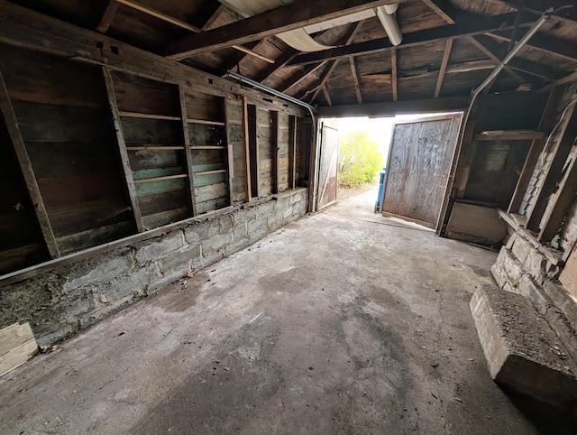 miscellaneous room with vaulted ceiling