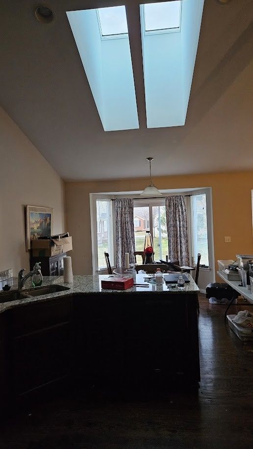 26123 Joanne Smith Ln, Chesterfield, MI 48051 - interior space featuring vaulted ceiling and wood finished floors