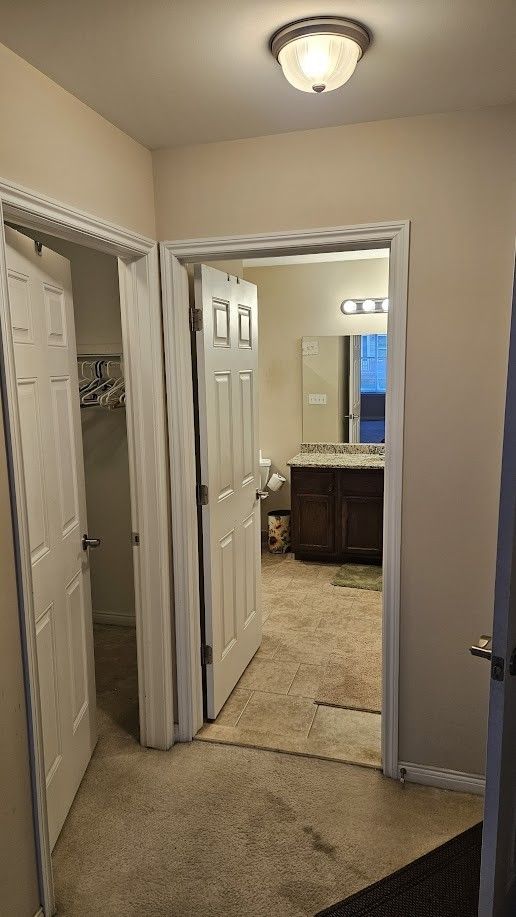 26123 Joanne Smith Ln, Chesterfield, MI 48051 - hall featuring light carpet