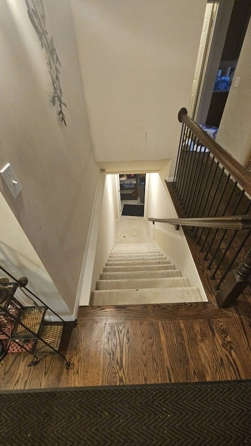 26123 Joanne Smith Ln, Chesterfield, MI 48051 - staircase with wood finished floors