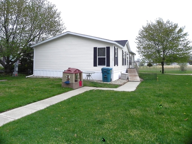 1232 Shiawassee River Rd, Three Rivers, MI 49093 - view of home's exterior featuring a lawn