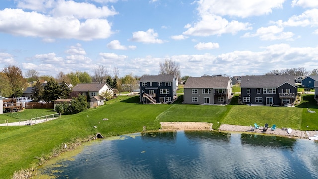 aerial view of residential area with a nearby body of water
