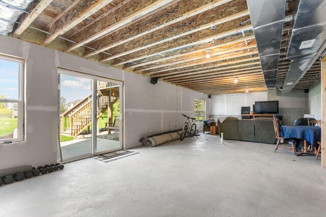 basement featuring plenty of natural light
