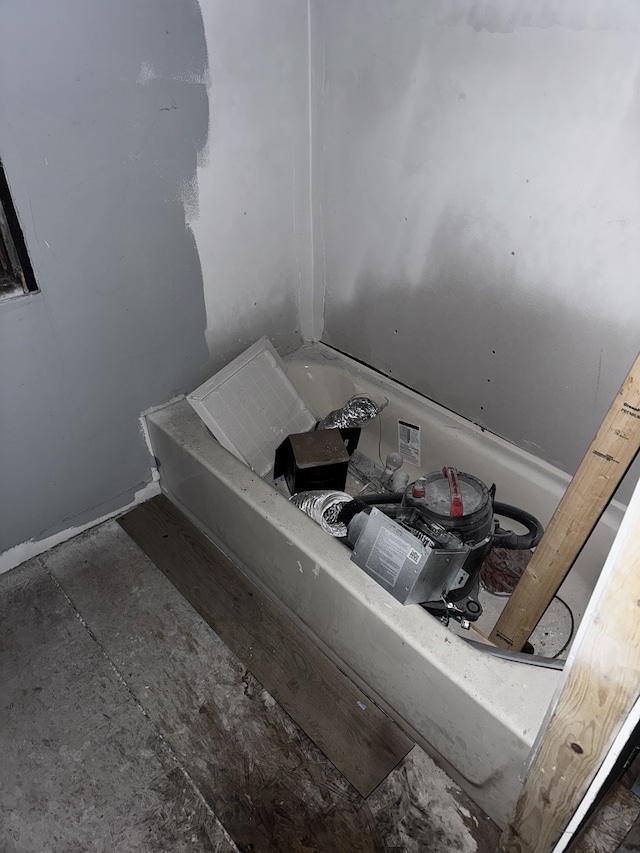 bathroom featuring a bath