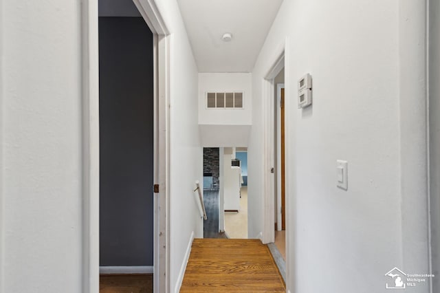 corridor featuring baseboards