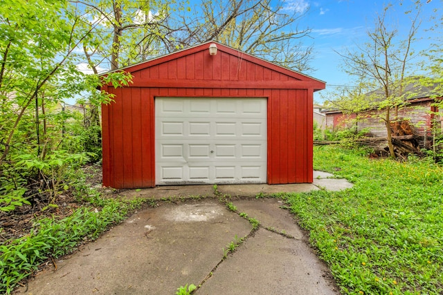 9171 Bishop St, Detroit, MI 48224 - detached garage featuring concrete driveway