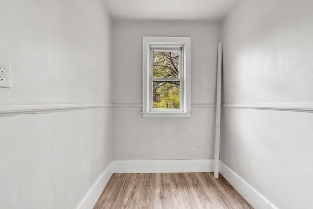 9171 Bishop St, Detroit, MI 48224 - spare room featuring wood finished floors and baseboards