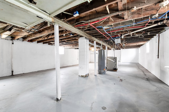 9171 Bishop St, Detroit, MI 48224 - below grade area featuring water heater