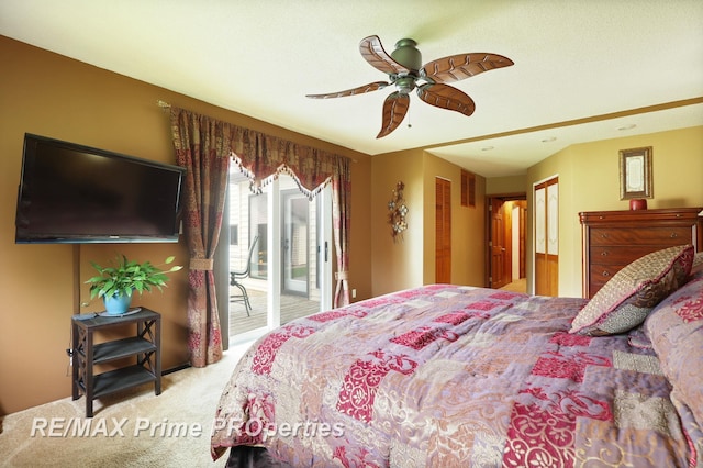 carpeted bedroom featuring access to outside and ceiling fan