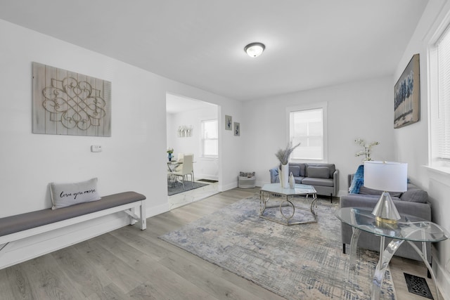 371 W Saratoga, Ferndale, MI 48220 - living area featuring wood finished floors, healthy amount of natural light, and baseboards