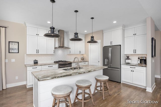 2044 Canopy Dr SW, Byron Center, MI 49315 - kitchen featuring stainless steel fridge with ice dispenser, wall chimney range hood, a sink, decorative backsplash, and dark wood-type flooring
