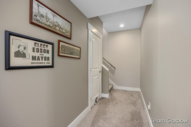 2044 Canopy Dr SW, Byron Center, MI 49315 - staircase featuring carpet floors and baseboards