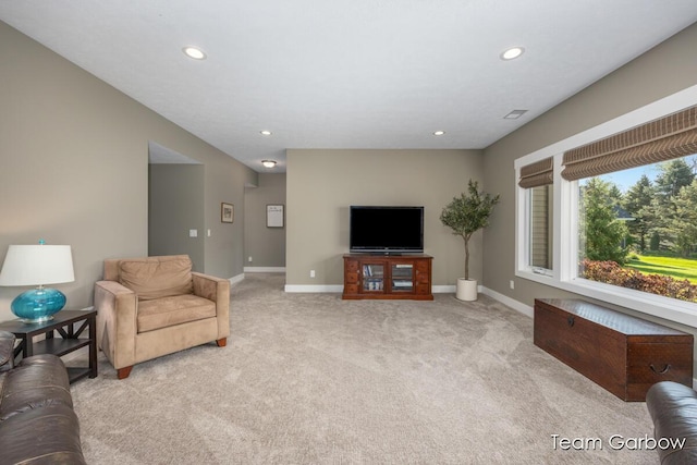 2044 Canopy Dr SW, Byron Center, MI 49315 - living area with light carpet, recessed lighting, and baseboards