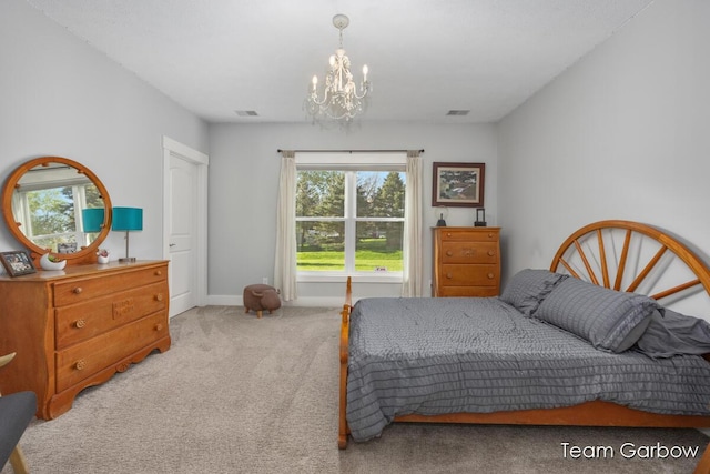 2044 Canopy Dr SW, Byron Center, MI 49315 - carpeted bedroom featuring a chandelier and baseboards