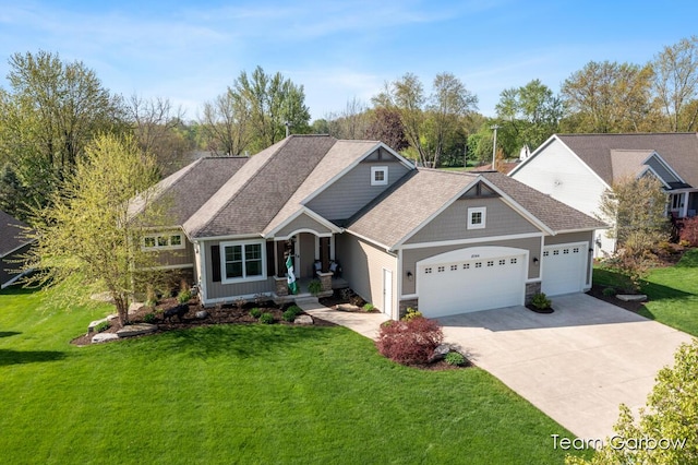 2044 Canopy Dr SW, Byron Center, MI 49315 - view of front of property with an attached garage, concrete driveway, and a front lawn