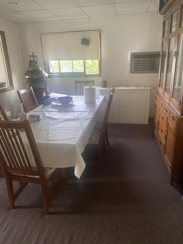 12765 NE Gregware Dr NE, Sand Lake, MI 49343 - dining area with carpet floors and a paneled ceiling