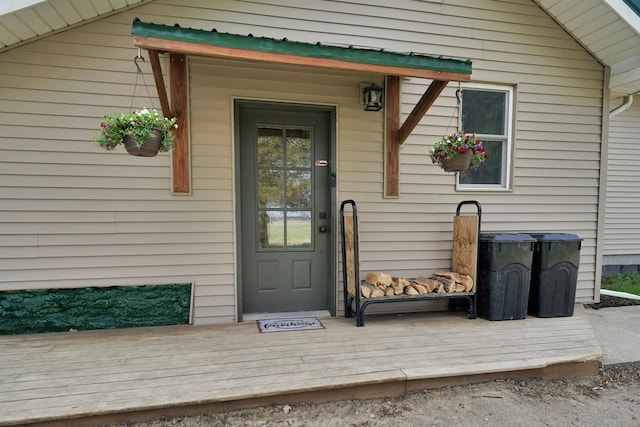entrance to property with a deck
