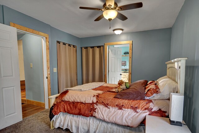 carpeted bedroom with baseboards and a ceiling fan