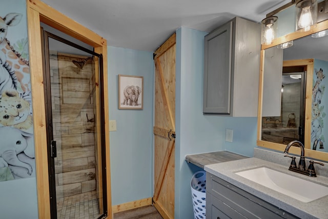 bathroom with vanity and a stall shower